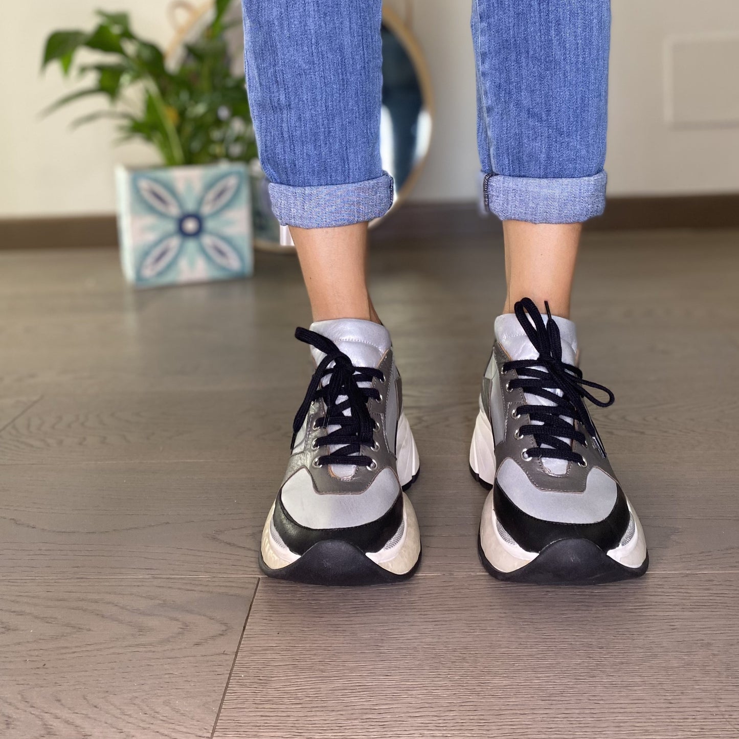 METAL Sneakers in pelle nera e argento con platform